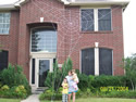 GIANT web on 2-story house image