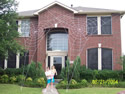 2 GIANT webs on 2-story house image