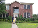 3 GIANT webs on 2-story house image